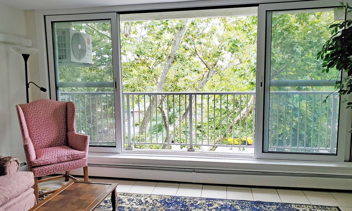 Queens Apartment | Sunny 1-bedroom apartment in Bayside, close to restaurants, shops, and train.