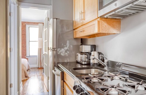 Ukrainian Village Apartment | Hip East Village 2BR w/W/D, near L Train, by Blueground
