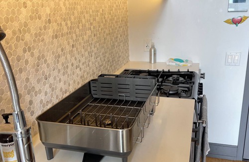 Greenpoint Condo | 1-bedroom on waterfront in Brooklyn with Balcony, Rooftop, Gym, WiFi, Top Floor!