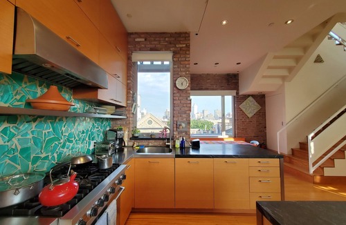 SoHo Apartment | 2 story Penthouse with incredible light, 26' ceilings & great outdoor space