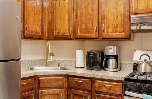 Bedford-Stuyvesant House | 2BD 1.5BA in Bedstuy, 55in tv coupled with a king and queen sized beds!