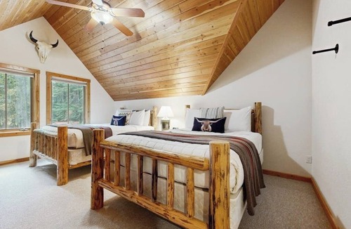 Bigfork House | Big Fork rustic loft cabin with forest views, WiFi, 5 miles to Flathead Lake