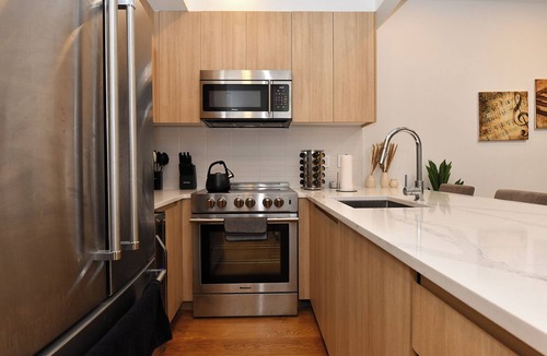 Midtown Apartment | Boho Rustic Escape in Midtown: 4BR, 2BA & Massive Terrace