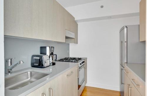 Midtown South Apartment | Chelsea 1BR w Balcony Doorman Gym NYC-158