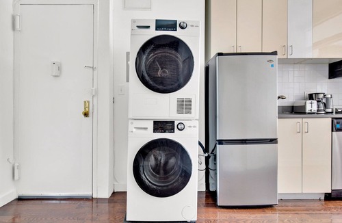 Chinatown Apartment | Deluxe LES 1BR w/W/D, steps to B/D Train & Park, by Blueground