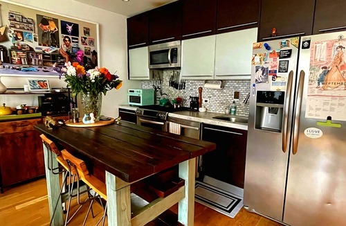 Greenpoint Condo | Experience Luxury by the Water:Private Garden & Unforgettable Views!