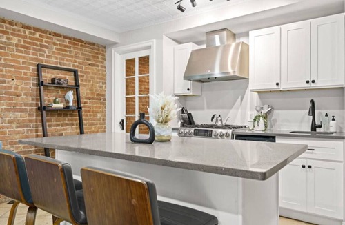 Central Park North House | Family Brownstone with Private Backyard Near Subway