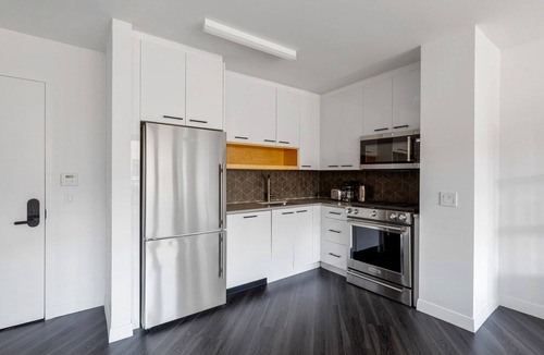 East Village Apartment | Lovely East Village 1BR w/Balcony, Doorman & W/D, nr bars, by Blueground