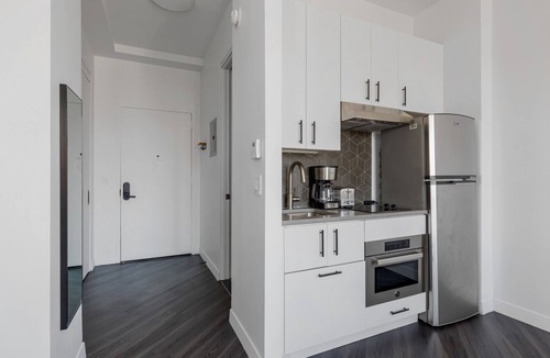 East Village Apartment | Lovely East Village 1BR w/Balcony, Garden & Gym, nr Bars, by Blueground