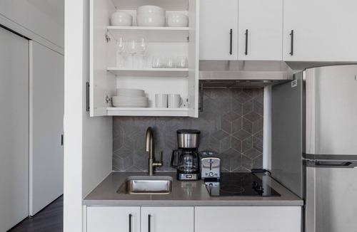 East Village Apartment | Lovely East Village 1BR w/Balcony, Garden & Gym, nr Bars, by Blueground