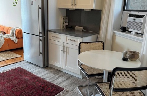 Ukrainian Village Apartment | Modern 1-bedroom apt in Bowery, New York with lots of natural light, WiFi, & AC