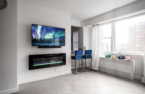 Mott Haven Apartment | Modern Manhattan Aparment with Electric Fire Place