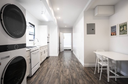 East Flushing Apartment | NEW! Luxury 4BD/4BA w/Rooftop Terrace & Outdoor Patio Kitchen