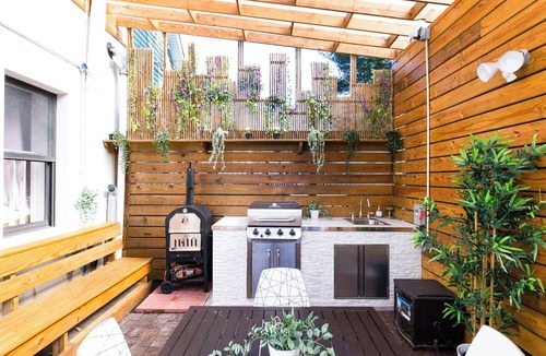 East Flushing House | Stylish 3-bedroom House with Skylight and Access to Rooftop Deck and Patio
