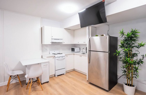 Queens Apartment | Stylish Studio Apartment on Main Street with Courtyard and Free Parking!