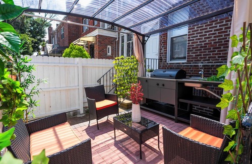 Queens Apartment | Stylish Studio Apartment on Main Street with Courtyard and Free Parking!