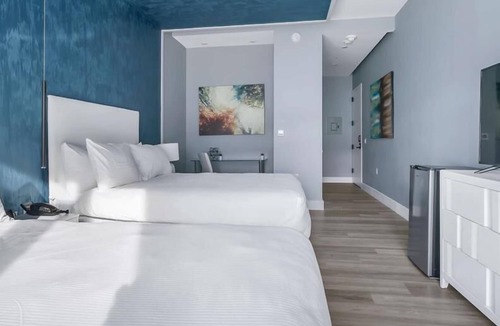 Mott Haven House | Upscale Double Queen Suite | Mott Haven | Fitness Center | Free WiFi