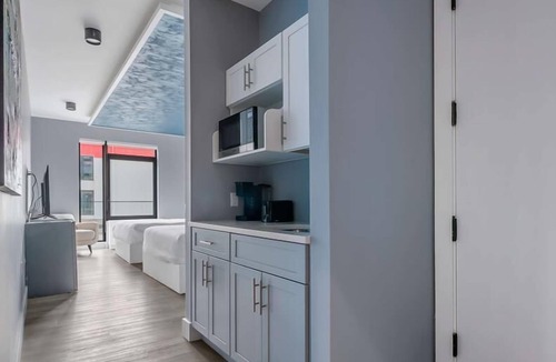 Mott Haven House | Upscale Double Queen Suite | Mott Haven | Fitness Center | Free WiFi