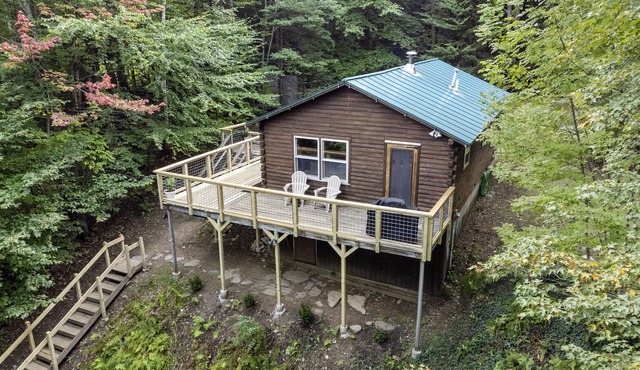 Rustic log cabin just minutes from Okemo Mountain!